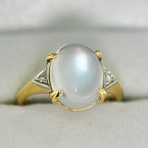 retro moonstone and diamond three stone ring