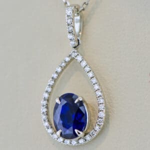 top quality royal blue sapphire and diamond frame pendant