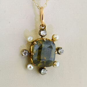 victorian antique pendant with diamonds pearls and rare radioactive green zircon