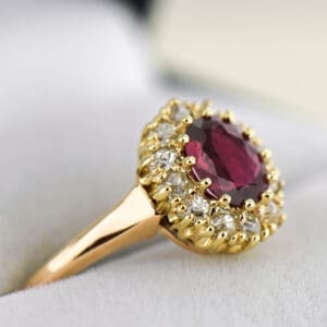 victorian maroon red ruby and diamond halo engagement ring