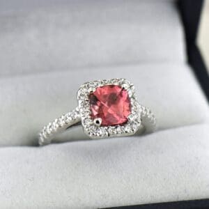 cushion cut orange pink tourmaline and diamond halo engagement ring 7