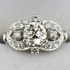 mid century white gold diamond ring with large old european cut diamond center