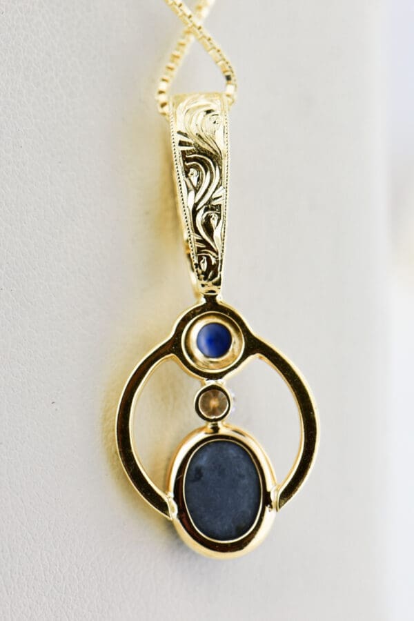 amazing custom gold pendant with blue black opal and blue sapphire 3