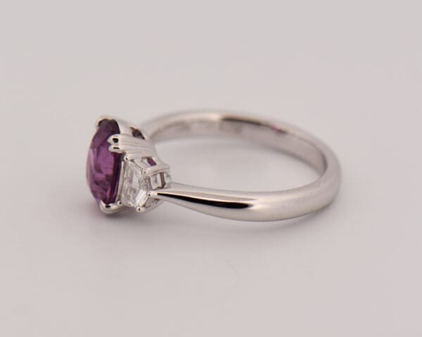 magenta purple sapphire and cadillac diamond three stone ring 2