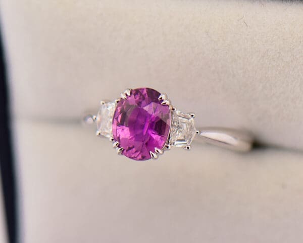 magenta purple sapphire and cadillac diamond three stone ring 3