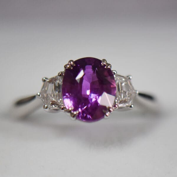 magenta purple sapphire and cadillac diamond three stone ring 4