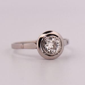 antique engagement ring with bezel set old euro diamond