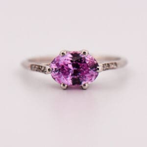 antique platinum engagement ring with lilac pink sapphire