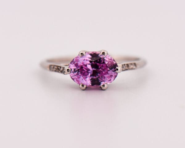 antique platinum engagement ring with lilac pink sapphire