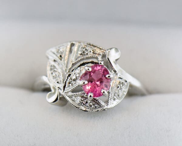 deco cluster ring with pink padparadscha sapphire and diamonds