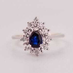 estate pear shape blue sapphire and double halo engagement ring