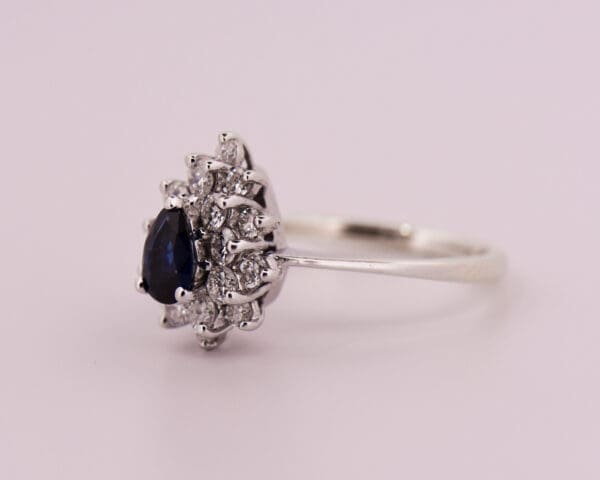 estate pear shape blue sapphire and double halo engagement ring 4