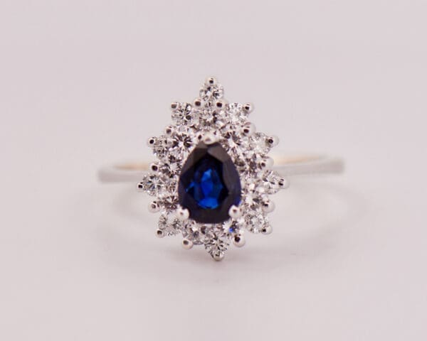 estate pear shape blue sapphire and double halo engagement ring