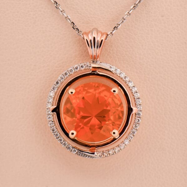 large round mexican fire opal and diamond pendant rose and white gold