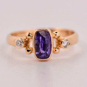 rare natural purple sapphire bezel set gold engagement ring