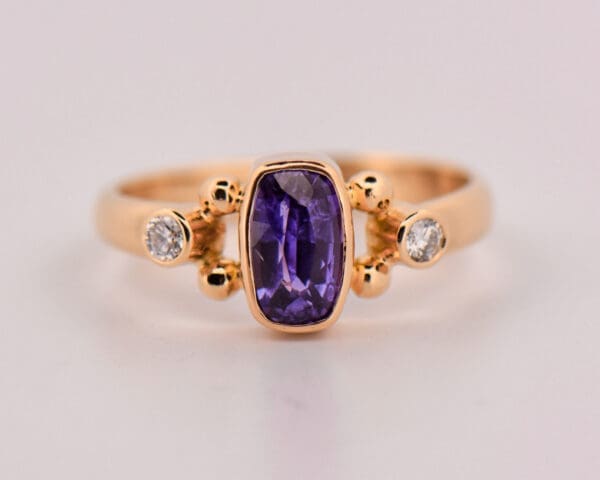 rare natural purple sapphire bezel set gold engagement ring