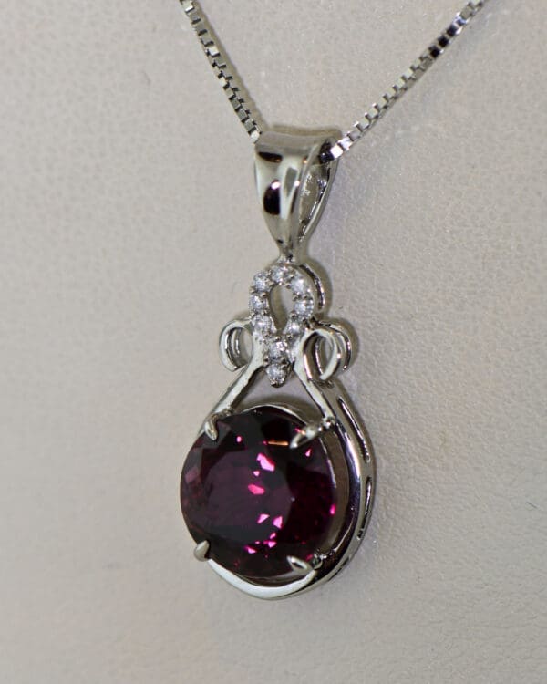 raspberry red rhodolite garnet and diamond pendant 4