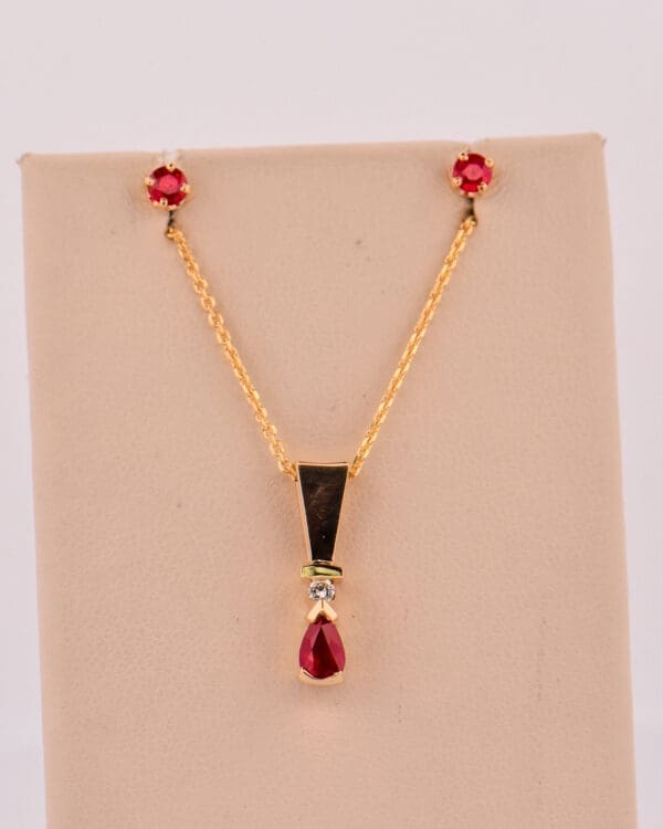 ruby and diamond pendant and stud earring set 3