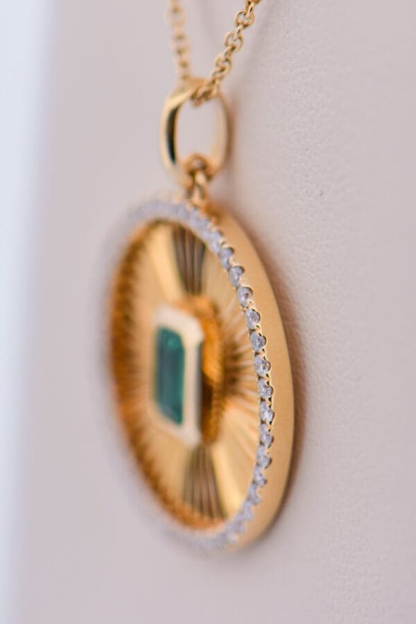 custom sunburst pendant with zambian emerald and diamonds 2