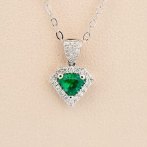 emerald and diamond shield superman pendant