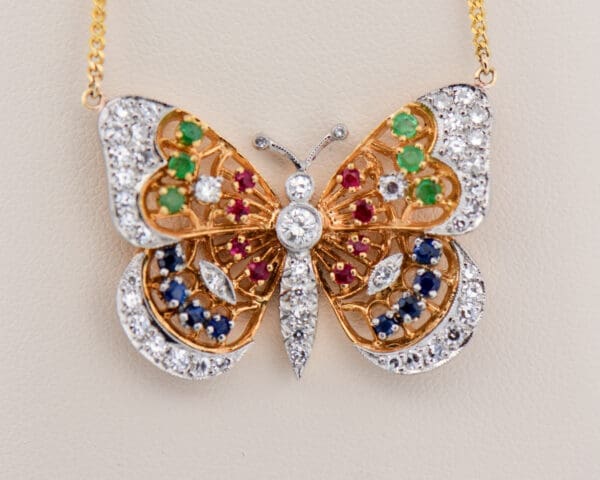 estate 18k gold diamond and gemstone set butterfly necklace