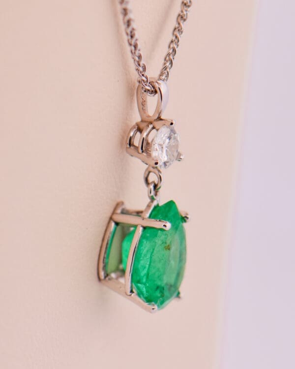 natural pear shape emerald and diamond drop pendant 2