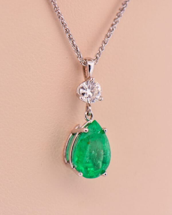 natural pear shape emerald and diamond drop pendant 4