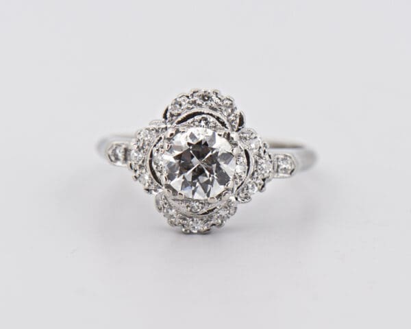 unusual art deco diamond ring with 1ct old euro center