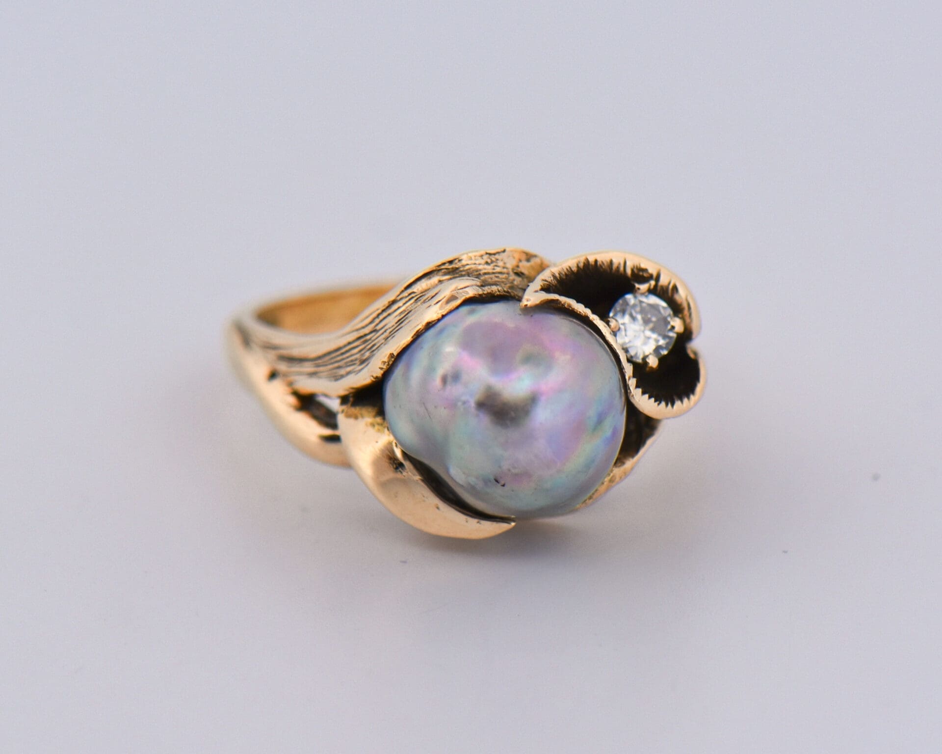 1960s vintage carved gold floral ring with baroque grey pearl and diamond