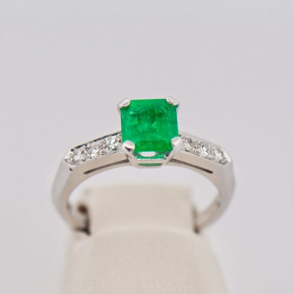 antique platinum colombian emerald and diamond engagement ring