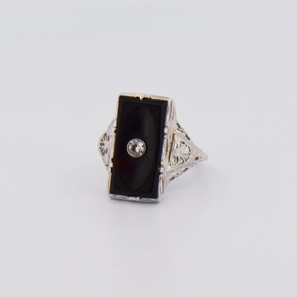 art deco onyx and diamond filigree ring