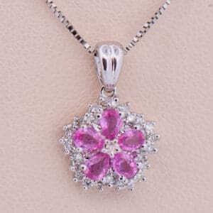 beautiful pink sapphire flower pendant white gold