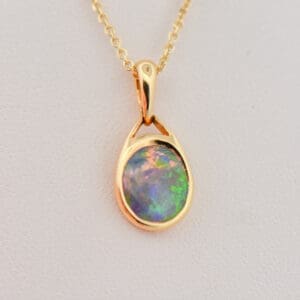 bezel set yellow gold australian opal solitaire pendant