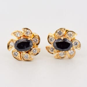 black diamond stud earrings with white diamond accents