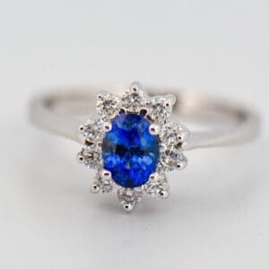 blue sapphire and diamond halo ring princess diana style