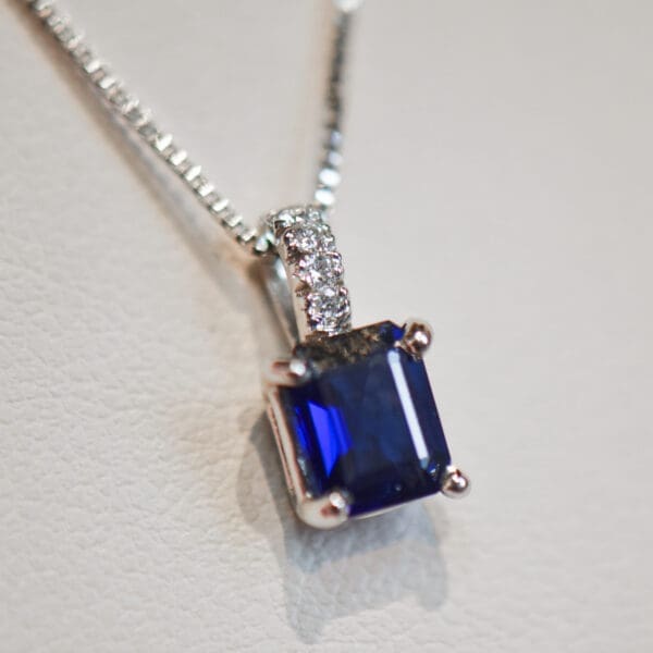 emerald cut blue sapphire solitaire pendant diamond bail 2