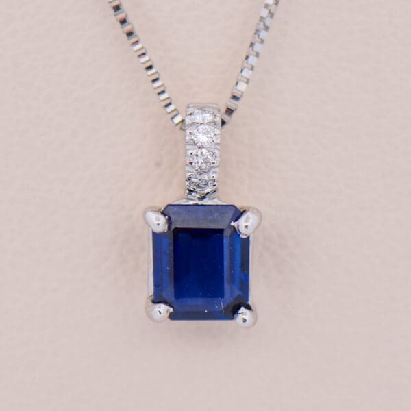 emerald cut blue sapphire solitaire pendant diamond bail