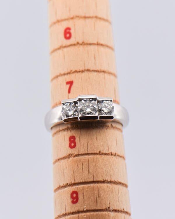 estate three stone low profile white gold diamond ring