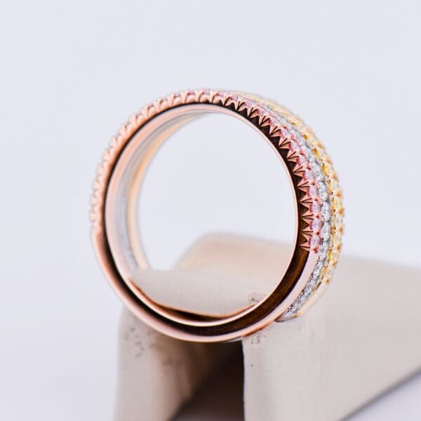 fancy pink diamond yellow diamond and white diamond stacking wedding bands 4