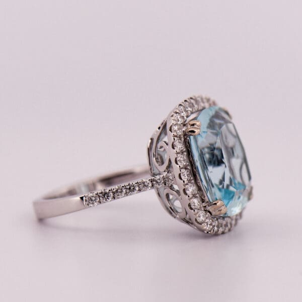 large cushion cut aquamarine and diamond halo cocktail ring 3