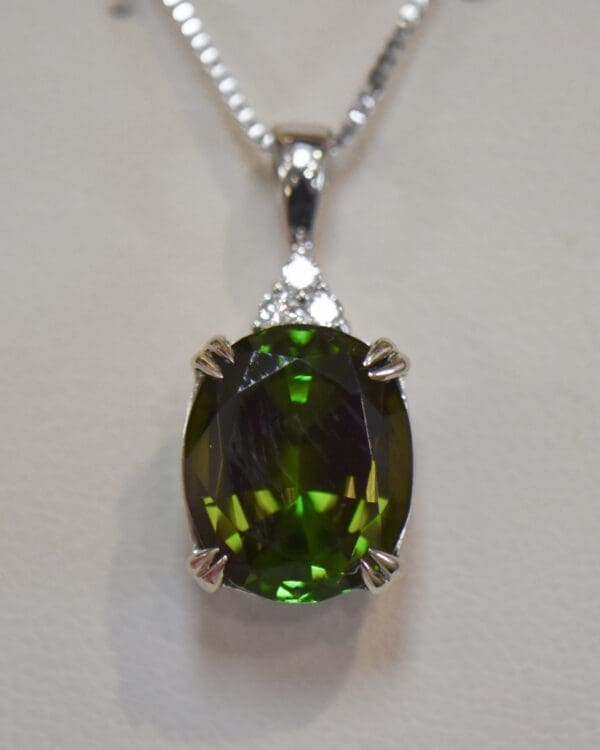 large dichroic deep green tourmaline and diamond pendant 3