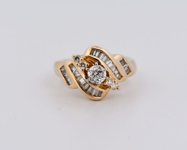 modern estate yellow gold diamond ring with channel set accents 3