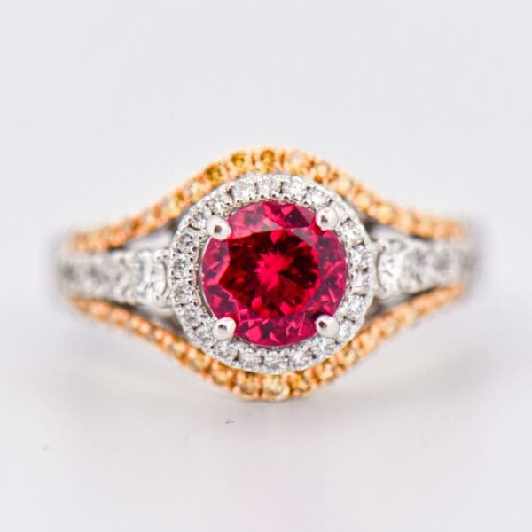 neon pink tanzanian spinel and yellow diamond ring