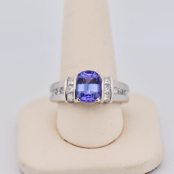 periwinkle color engagement ring with natural tanzanite and diamonds 3