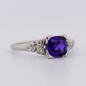 rare neon purple sapphire and platinum engagement ring