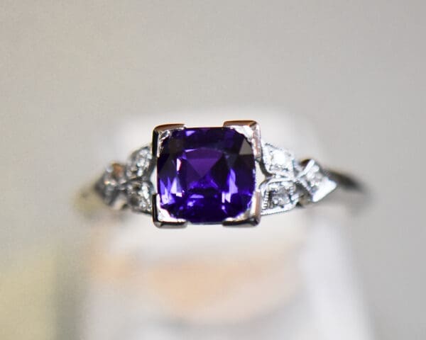 rare neon purple sapphire and platinum engagement ring 4