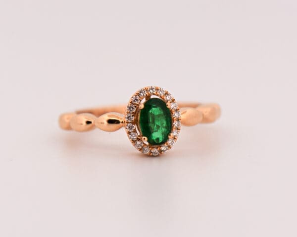 ruby sappire and emerald halo birthstone rings 2