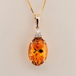 top quality oval citrine and diamond pendant in gold