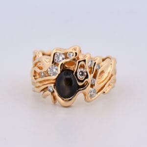 vintage freeform gents ring with black star sapphire and diamonds