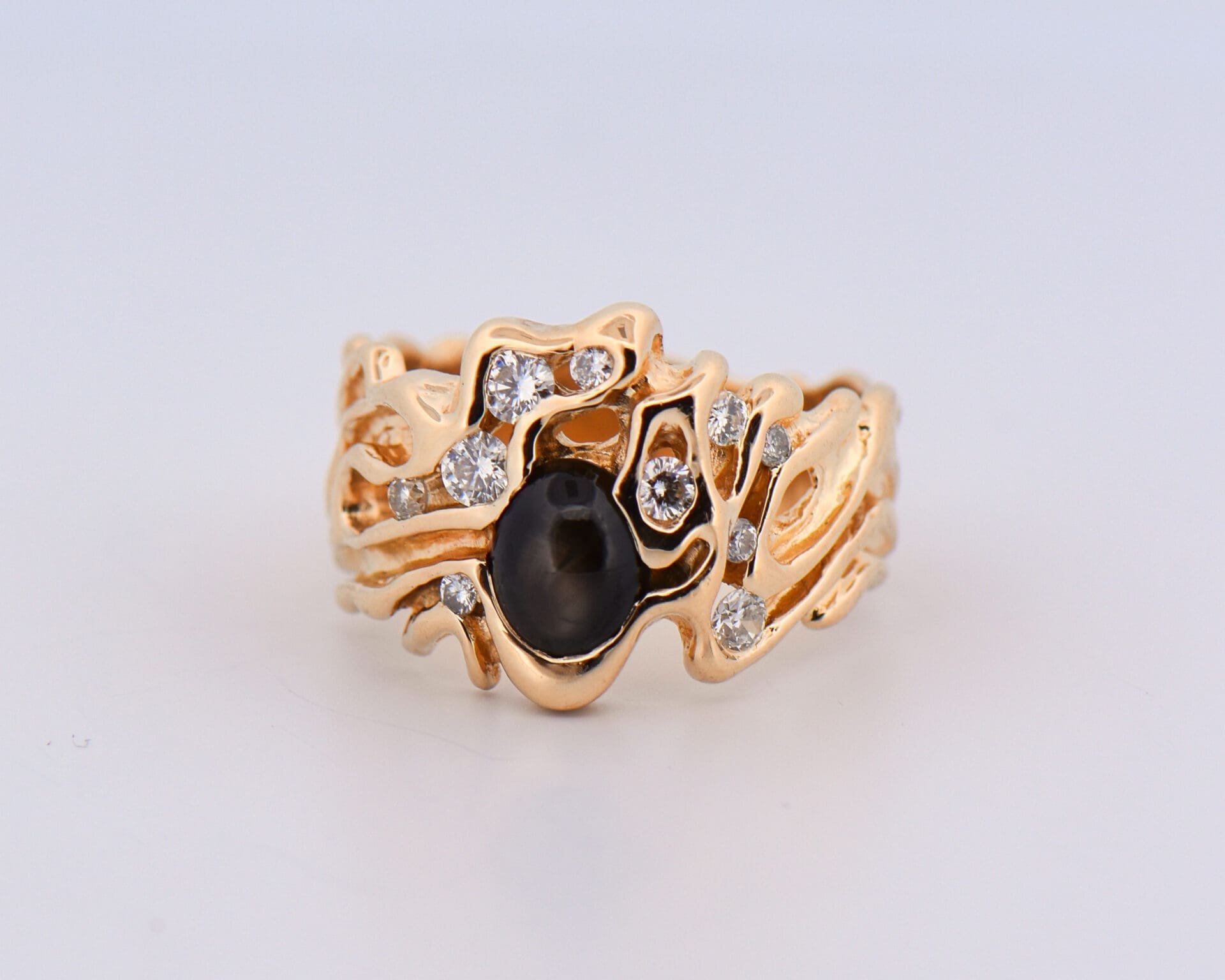 vintage freeform gents ring with black star sapphire and diamonds